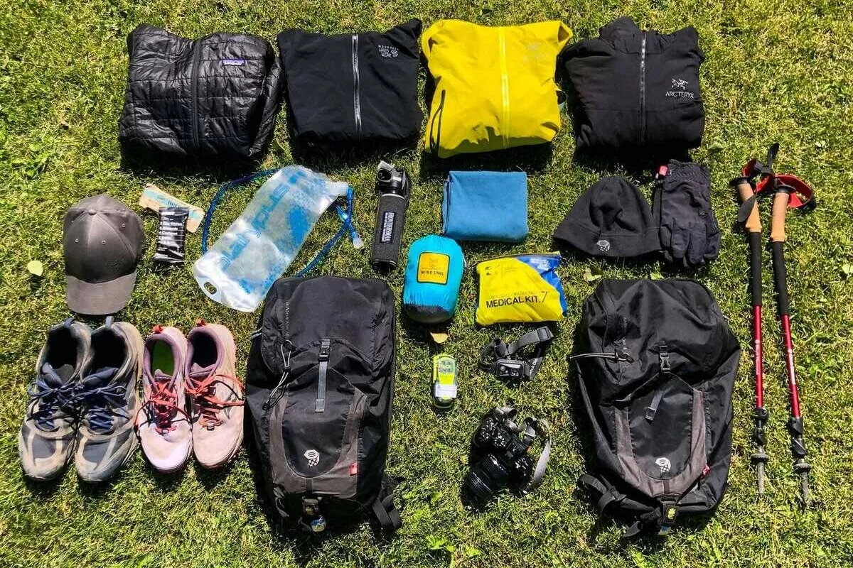 Hiking essentials laid out for a day hike preparation