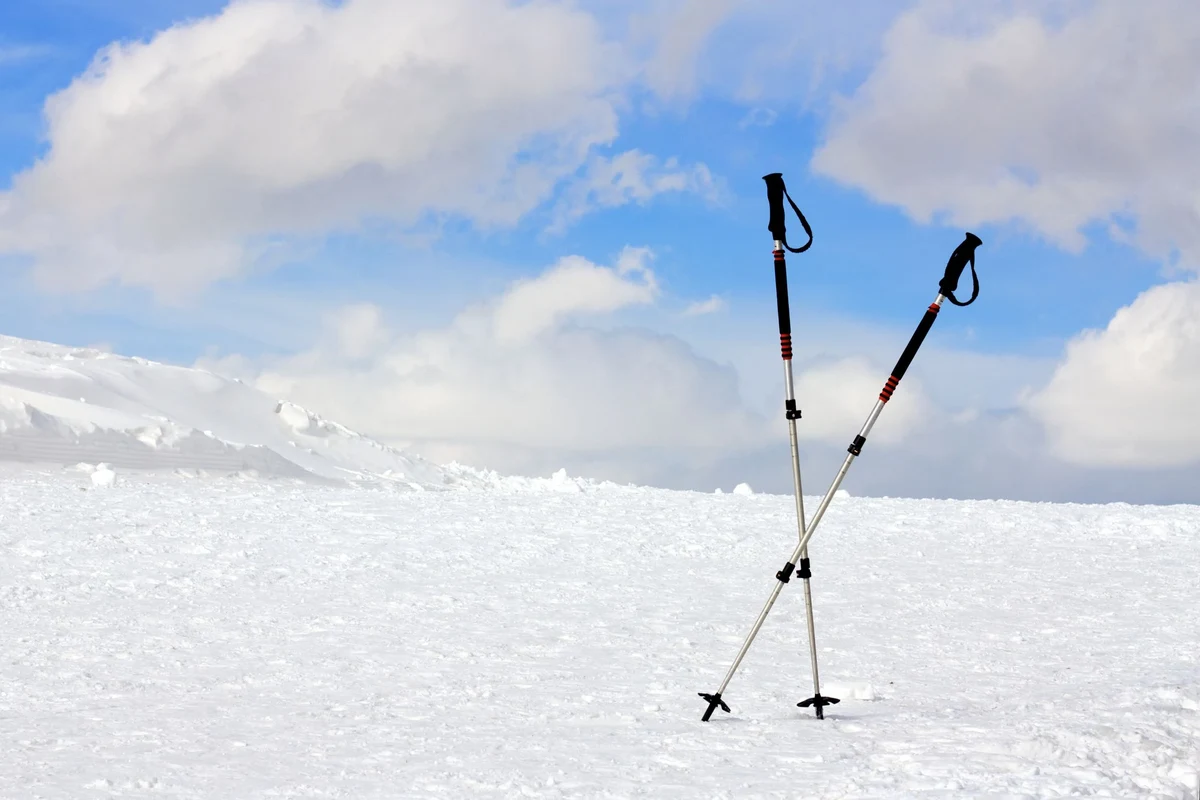 Hiking poles for skiing on snowy mountain terrain