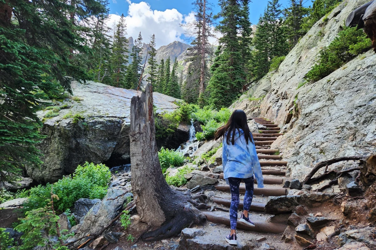 Hiker enjoying breathtaking views in Colorado's mountains