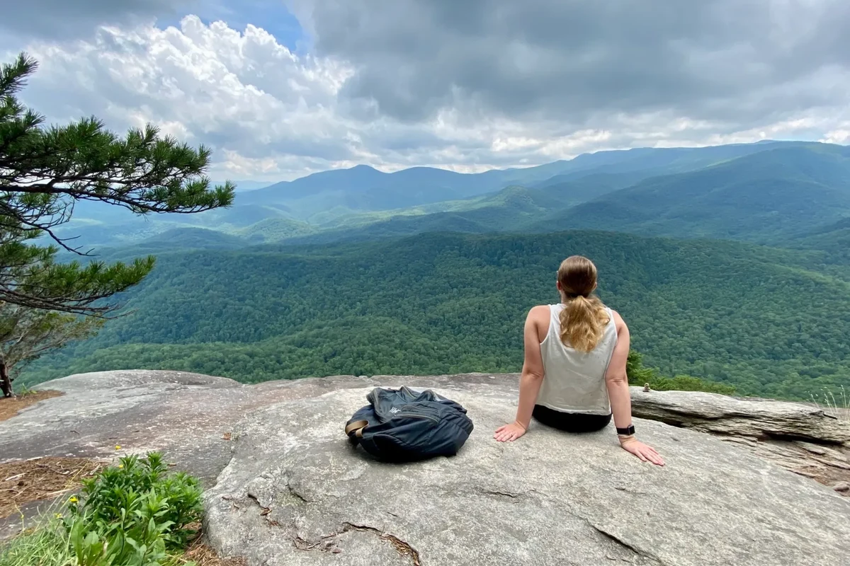 Hiker enjoying stunning views in Pisgah National Forest, NC