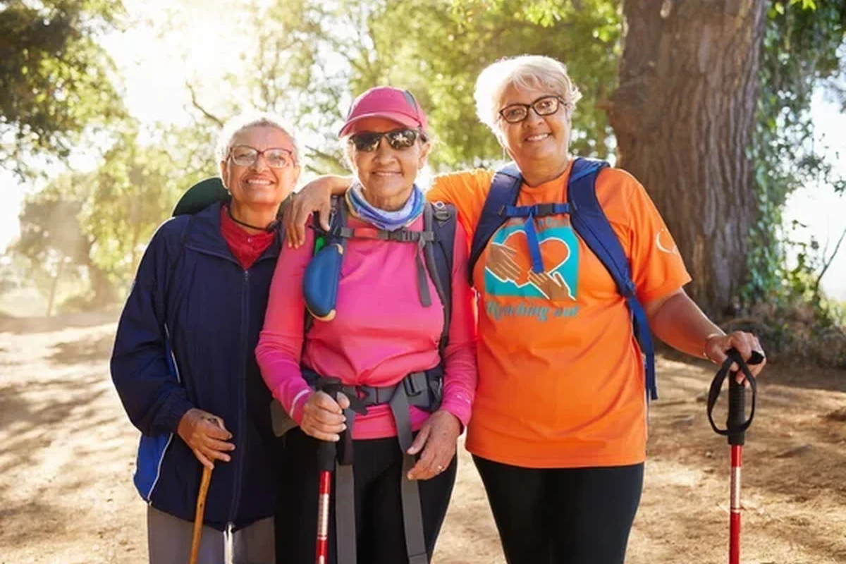 Group of older hikers enjoying a scenic trail together