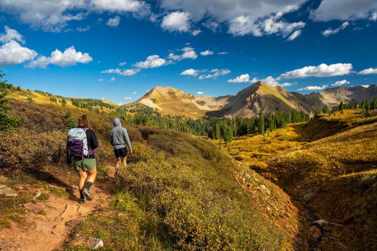 Hiker enjoying breathtaking views in the Colorado mountains