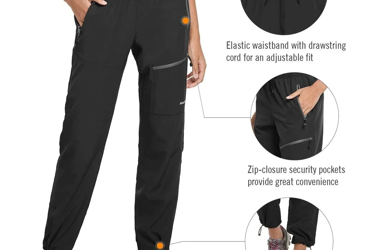 Woman wearing water resistant hiking pants on a trail