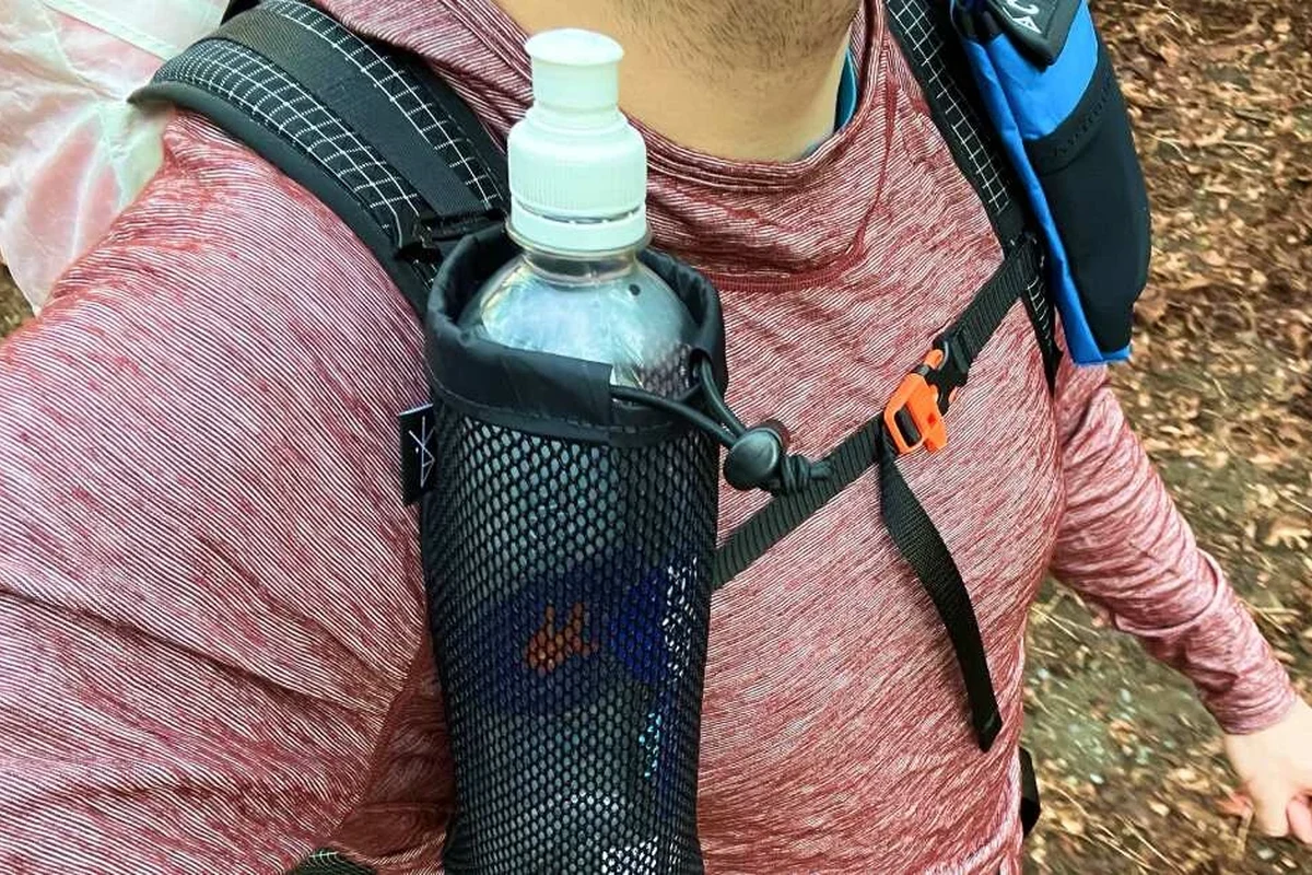 Travel backpack featuring a convenient water bottle holder