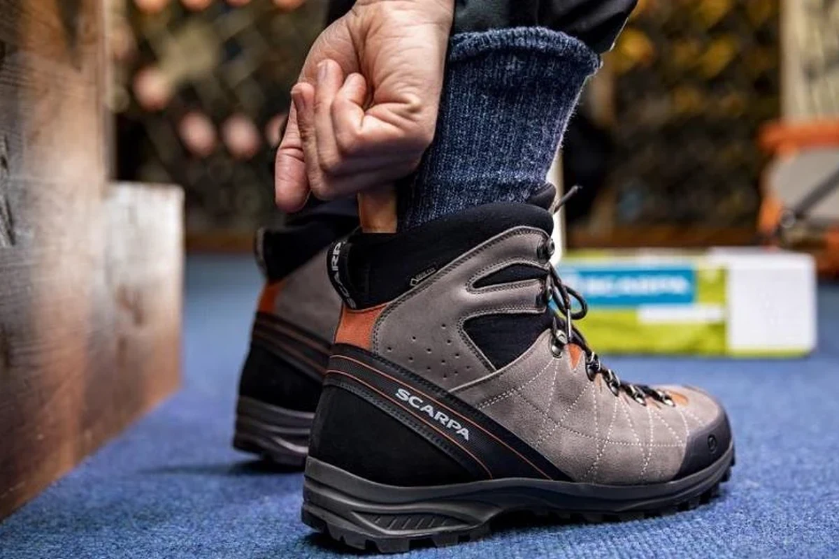 Hiking boots with good ankle support on a rocky trail